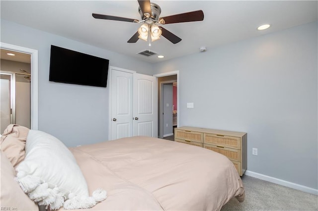 bedroom with light carpet, visible vents, recessed lighting, and baseboards