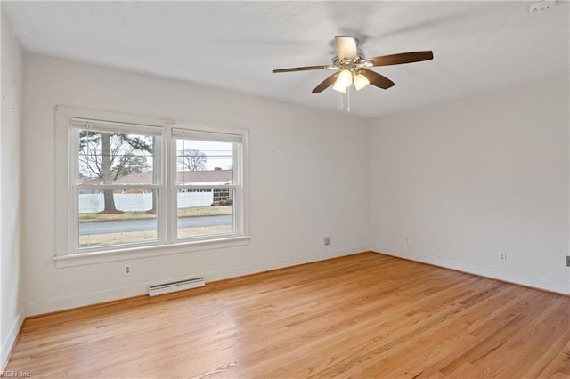 unfurnished room with visible vents, baseboards, ceiling fan, and light wood finished floors