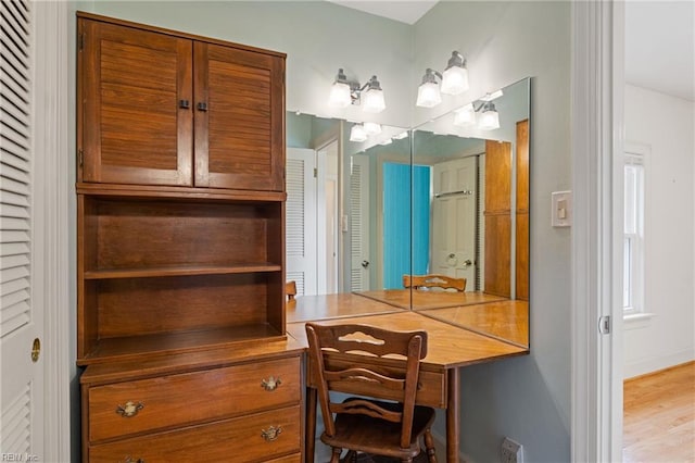 home office featuring wood finished floors