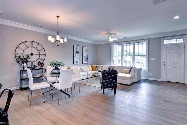 5311 Salzman St, Williamsburg, VA 23188 - living area featuring crown molding, wood finished floors, baseboards, ceiling fan, and a chandelier