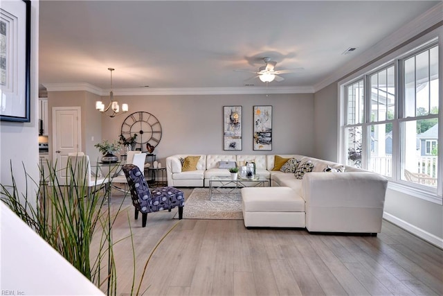 5311 Salzman St, Williamsburg, VA 23188 - living room featuring a chandelier, light wood-type flooring, baseboards, a ceiling fan, and ornamental molding