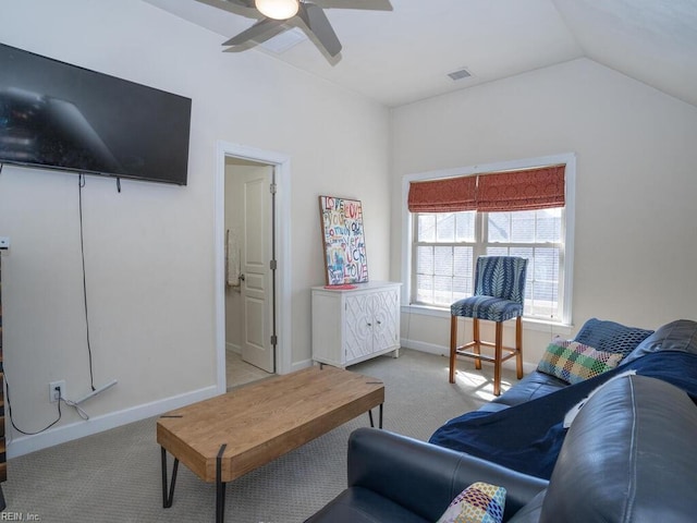 carpeted living area with vaulted ceiling, a ceiling fan, visible vents, and baseboards