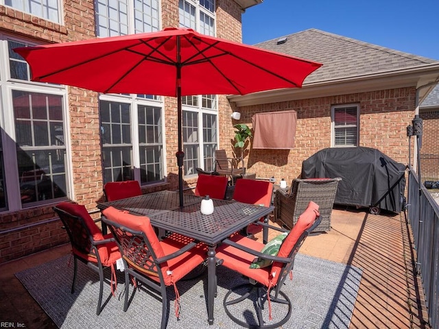 view of patio / terrace with area for grilling and outdoor dining space