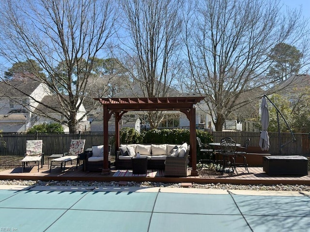 view of pool featuring a deck, fence, a pergola, and outdoor lounge area