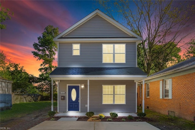 traditional-style home with covered porch