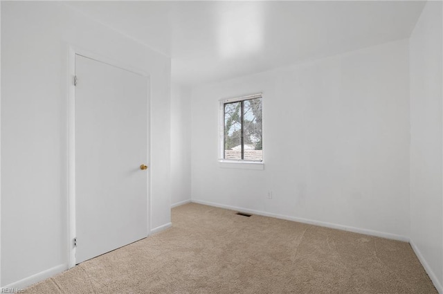 2118 Madison Ave, Newport News, VA 23607 - unfurnished room with carpet flooring, baseboards, and visible vents