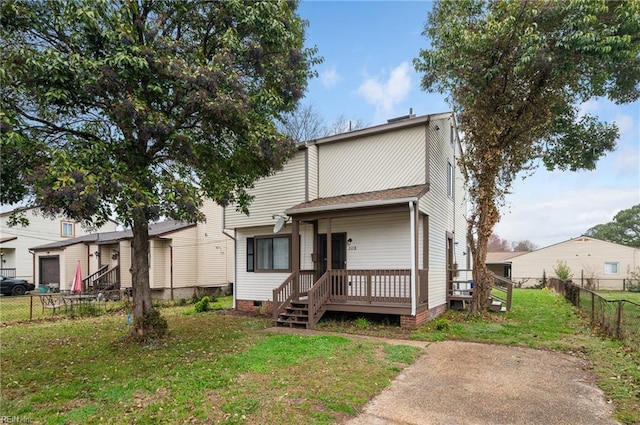 2118 Madison Ave, Newport News, VA 23607 - view of front of home with a shingled roof, crawl space, a front yard, and fence private yard