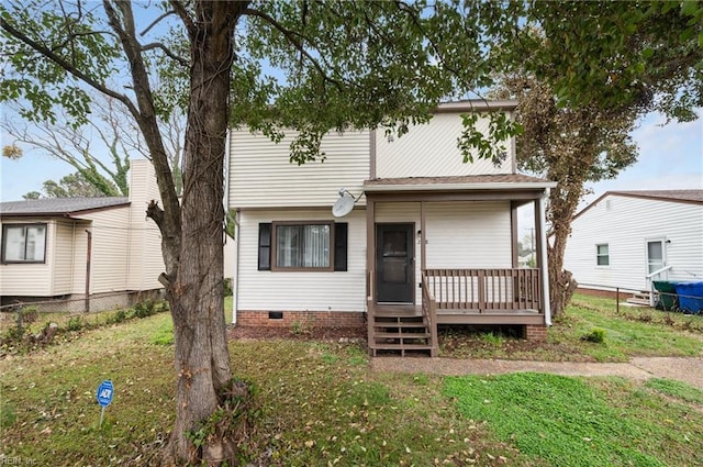 2118 Madison Ave, Newport News, VA 23607 - view of front facade with a front lawn, crawl space, covered porch, and fence
