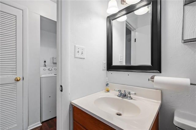 2118 Madison Ave, Newport News, VA 23607 - half bath with toilet, washer / clothes dryer, and vanity