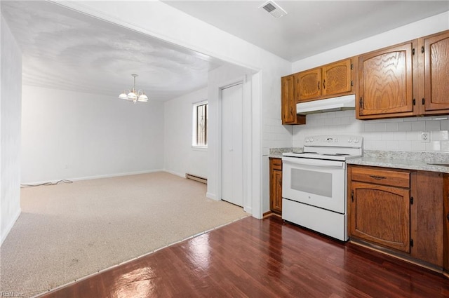 2118 Madison Ave, Newport News, VA 23607 - kitchen featuring a notable chandelier, white electric stove, under cabinet range hood, visible vents, and a baseboard heating unit