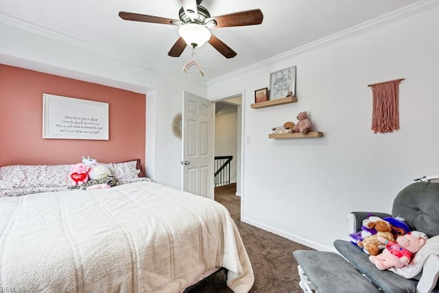 bedroom with crown molding, baseboards, dark carpet, and ceiling fan