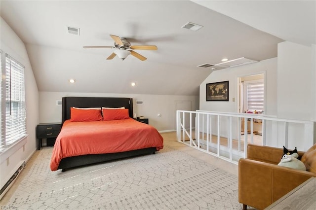 bedroom with lofted ceiling, carpet flooring, and visible vents