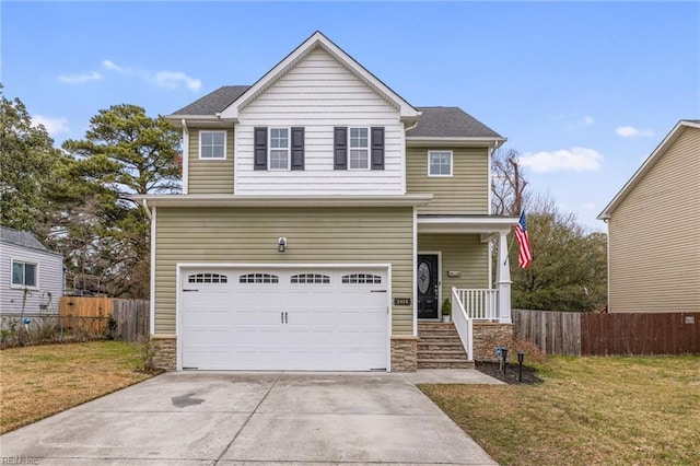 traditional-style house with stone siding, concrete driveway, a garage, and fence