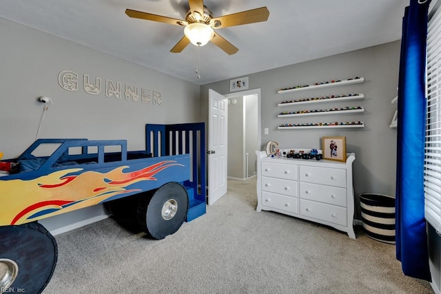 bedroom featuring carpet and ceiling fan