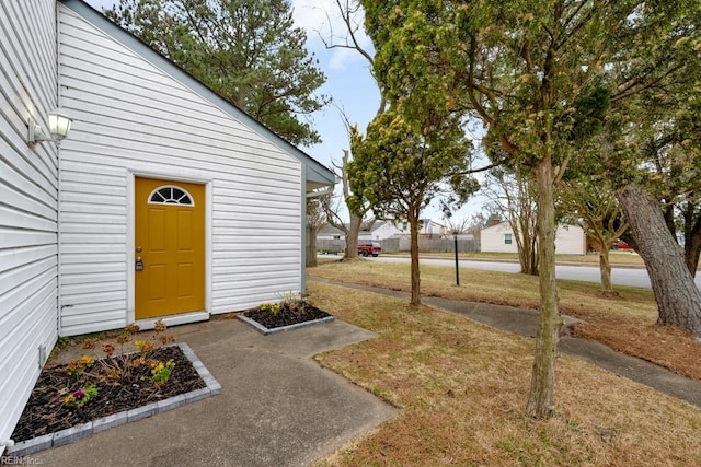 exterior space featuring a lawn