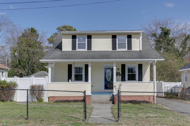bungalow featuring a fenced front yard, covered porch, a front yard, and a gate