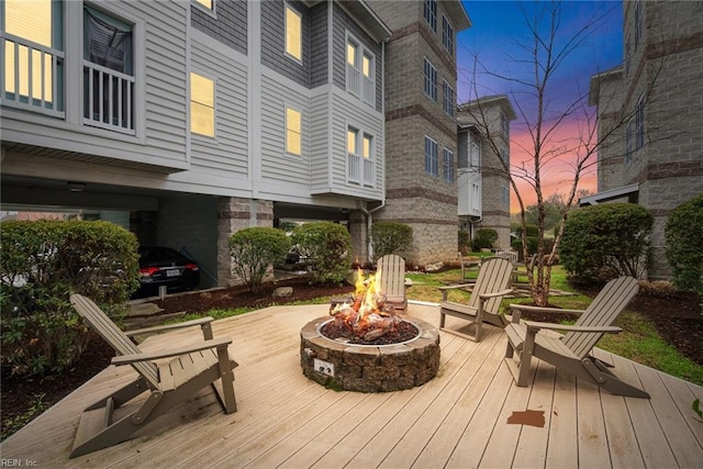 7922 Shore Dr Unit 304, Norfolk, VA 23518 - wooden terrace featuring an outdoor fire pit