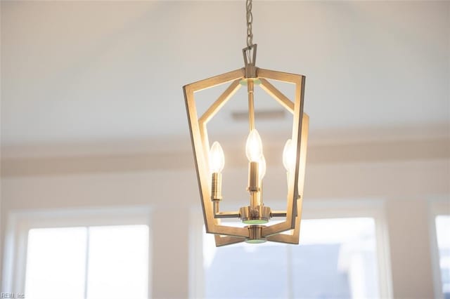 details featuring a chandelier