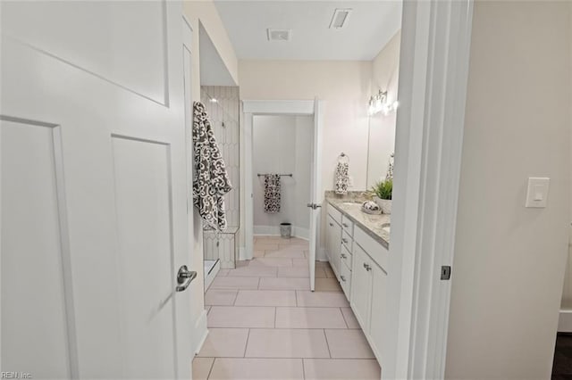 full bath with vanity, visible vents, and tile patterned flooring