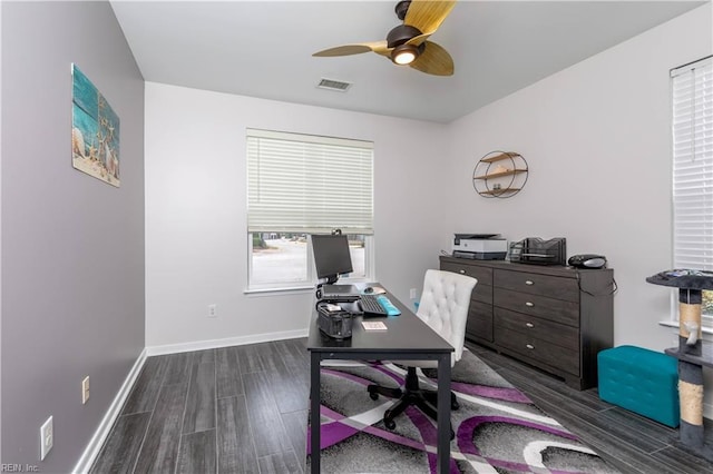 office space featuring visible vents, baseboards, wood finished floors, and a ceiling fan