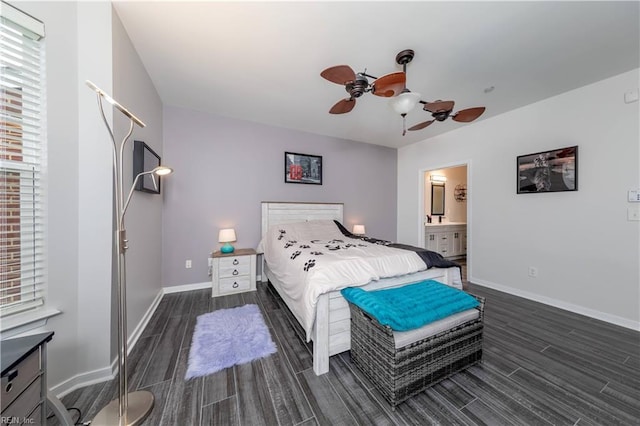 bedroom featuring wood finish floors, baseboards, ceiling fan, and ensuite bathroom