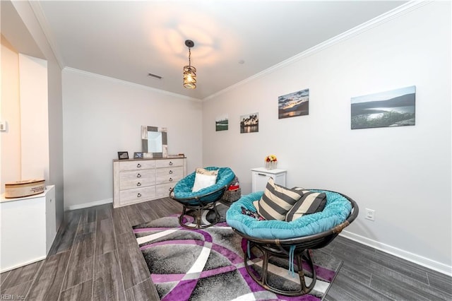 living area featuring wood finished floors, baseboards, and ornamental molding