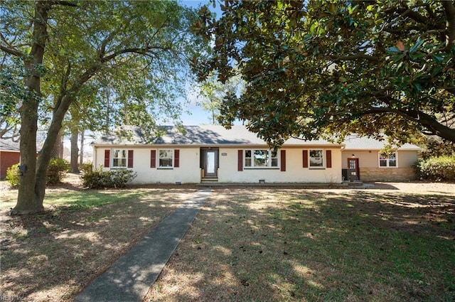 ranch-style home with a front yard