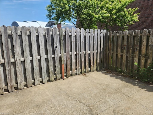 view of patio with fence