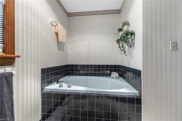 full bathroom featuring wallpapered walls and a garden tub