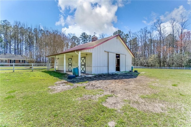 view of outdoor structure featuring an exterior structure and an outbuilding