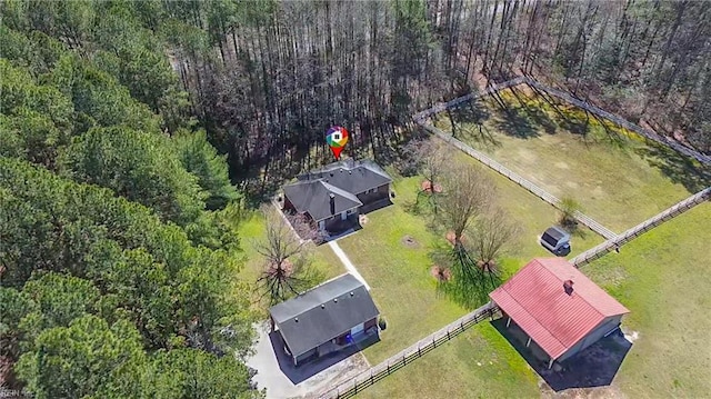 bird's eye view featuring a rural view and a forest view
