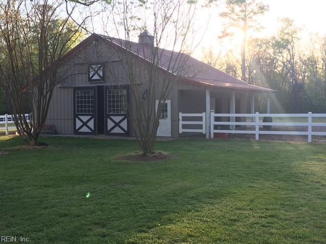 view of barn with an exterior structure