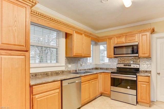 507 Bellwood Rd, Newport News, VA 23601 - kitchen with a sink, tasteful backsplash, appliances with stainless steel finishes, and light brown cabinetry