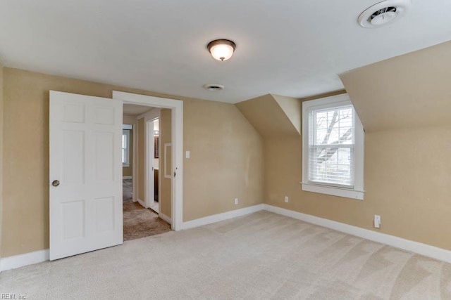 507 Bellwood Rd, Newport News, VA 23601 - additional living space featuring baseboards, light colored carpet, and vaulted ceiling