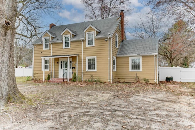 507 Bellwood Rd, Newport News, VA 23601 - view of front facade with a chimney and fence