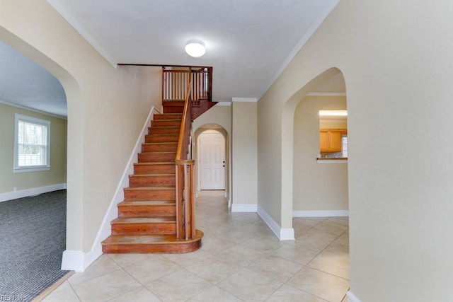 507 Bellwood Rd, Newport News, VA 23601 - stairway featuring arched walkways, tile patterned flooring, crown molding, and baseboards