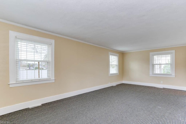 507 Bellwood Rd, Newport News, VA 23601 - spare room with dark carpet, baseboards, and ornamental molding