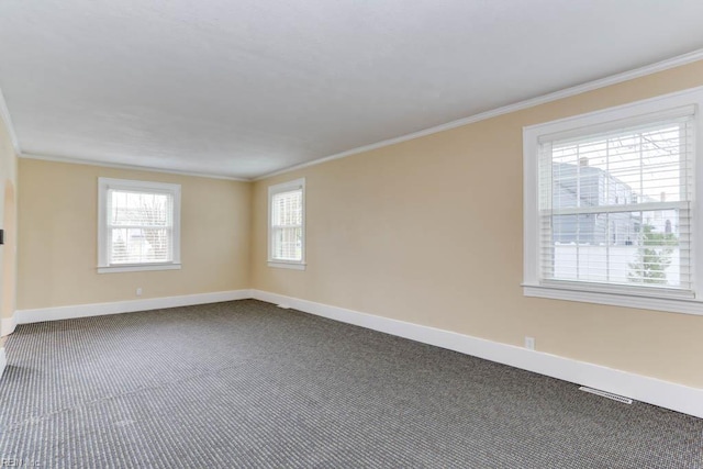 507 Bellwood Rd, Newport News, VA 23601 - unfurnished room with visible vents, ornamental molding, baseboards, and dark colored carpet
