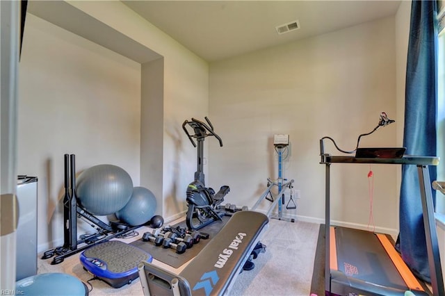 workout area featuring visible vents and baseboards