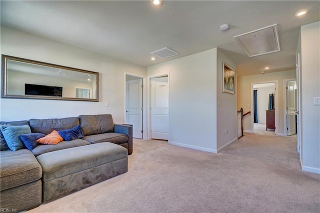 living room featuring visible vents, light carpet, recessed lighting, baseboards, and attic access