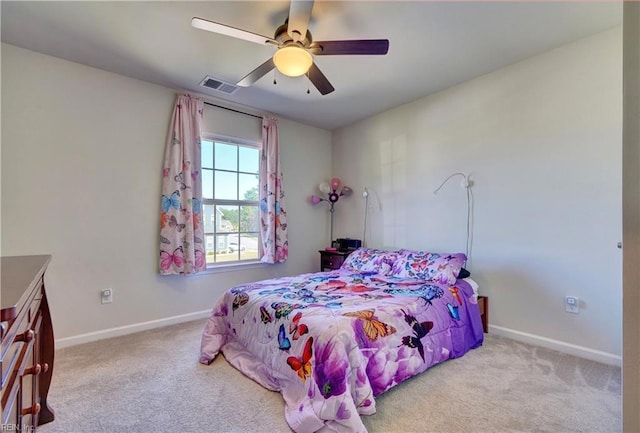 bedroom with visible vents, baseboards, carpet, and ceiling fan