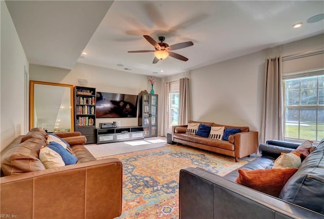 living room featuring a wealth of natural light, recessed lighting, and a ceiling fan