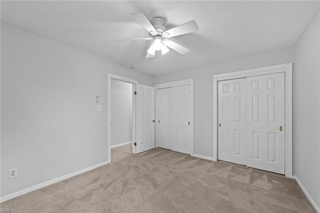4825 Berrywood Rd, Virginia Beach, VA 23464 - unfurnished bedroom featuring ceiling fan, baseboards, multiple closets, and carpet floors