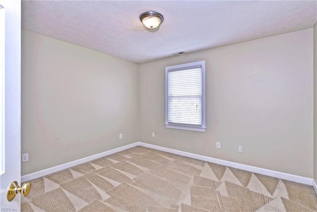 296 Walt Whitman Ave, Newport News, VA 23606 - spare room featuring a textured ceiling, baseboards, visible vents, and light carpet