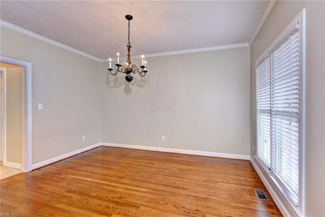 296 Walt Whitman Ave, Newport News, VA 23606 - empty room featuring crown molding, baseboards, light wood-style floors, and an inviting chandelier