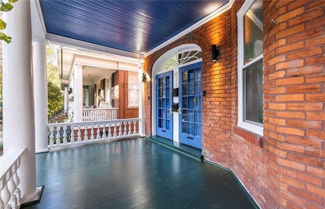 view of patio / terrace with covered porch and french doors