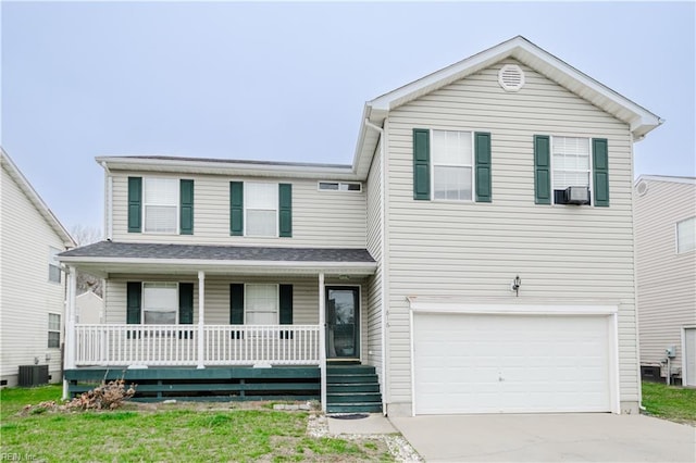 traditional-style house featuring driveway, cooling unit, a garage, central AC, and a porch
