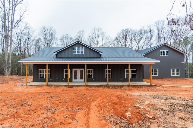 11AC Glass Rd, Hayes, VA 23072 - view of front of home featuring french doors, metal roof, and a patio area