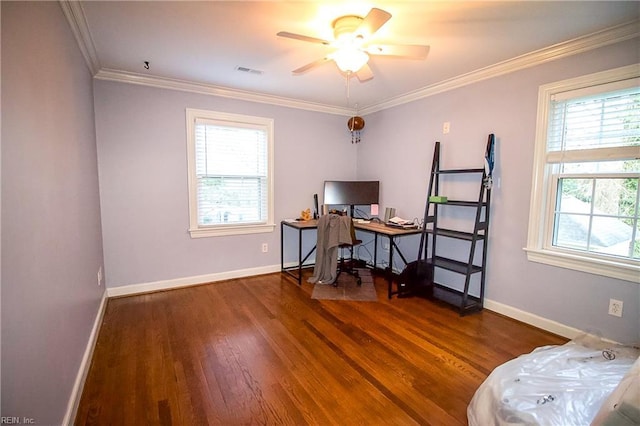 office featuring crown molding, wood finished floors, baseboards, visible vents, and ceiling fan