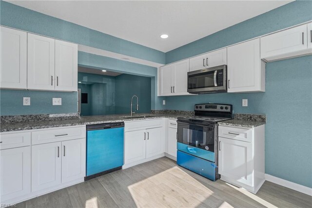 689 Biltmore Dr, Virginia Beach, VA 23454 - kitchen with stainless steel microwave, dishwasher, white cabinets, black electric range oven, and a sink